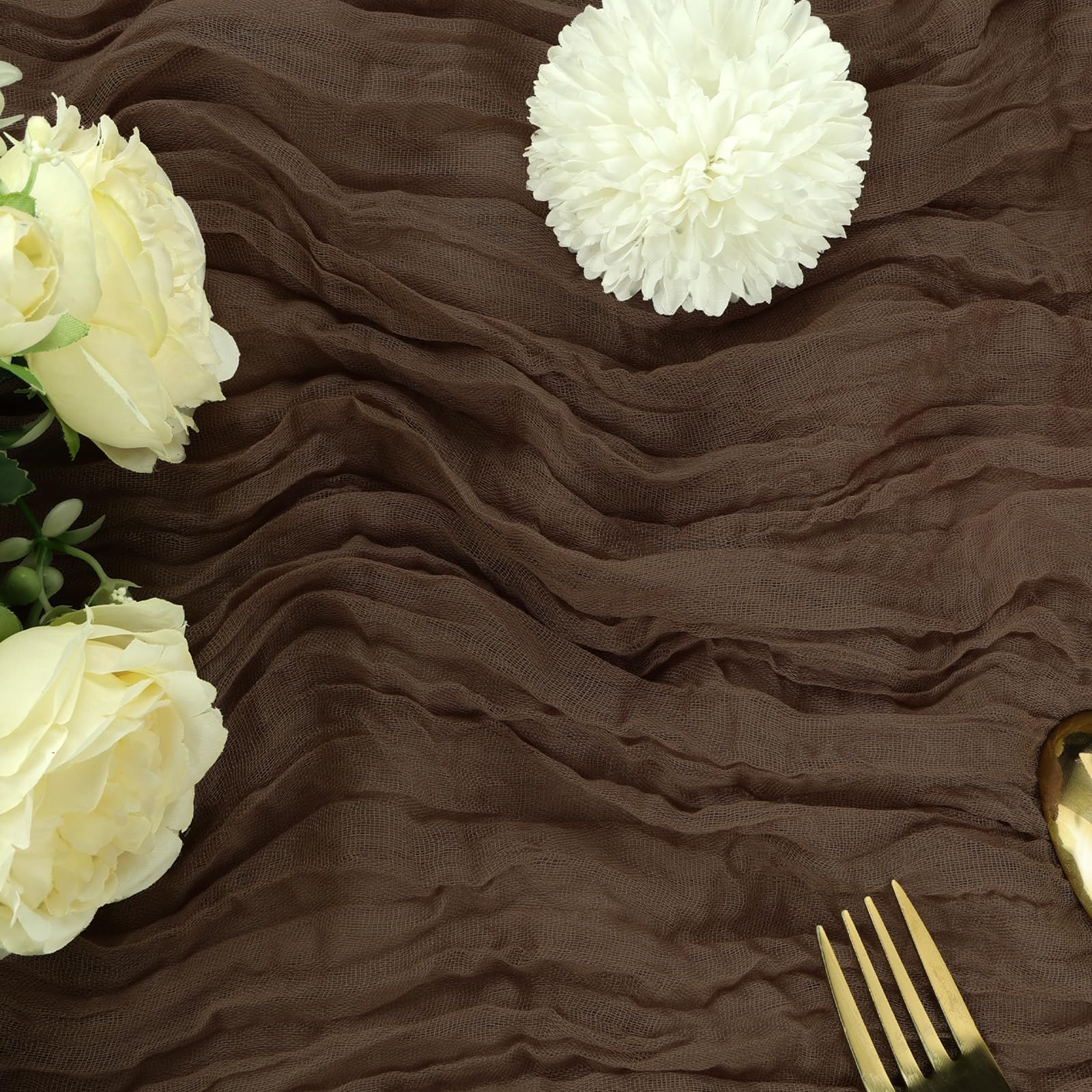 RestfulGlow table runner draped over a wedding arch creates a soft romantic backdrop.