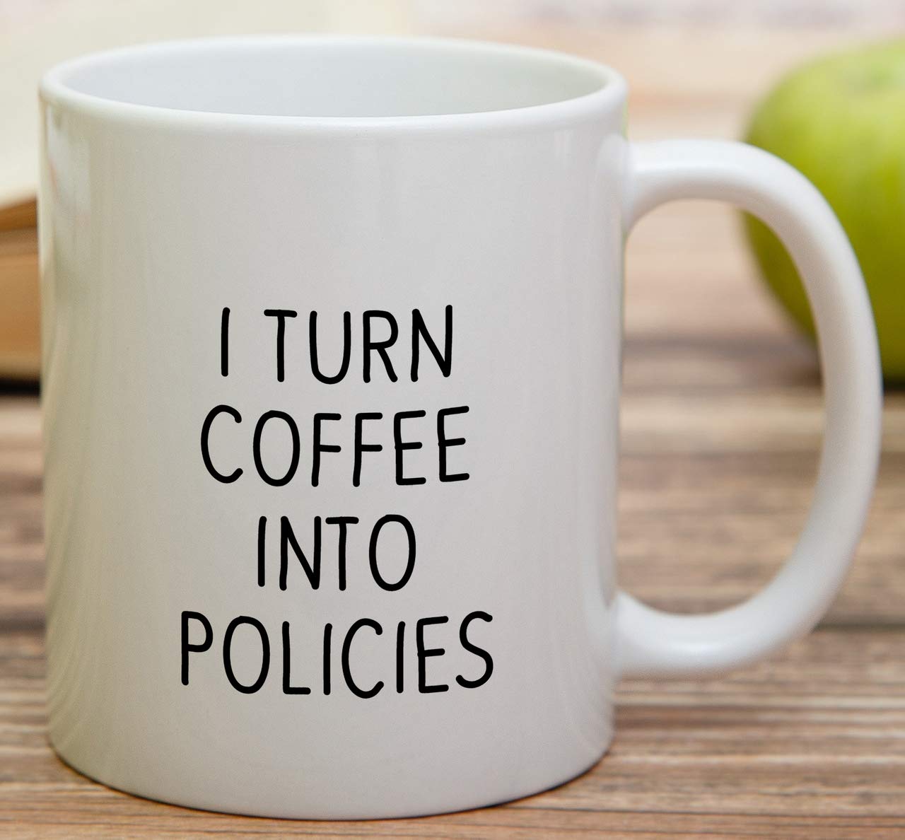Retreez white ceramic mug sits on a tidy desk, ready for hot beverages.