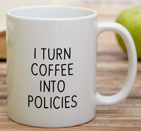 Retreez white ceramic mug sits on a tidy desk, ready for hot beverages.
