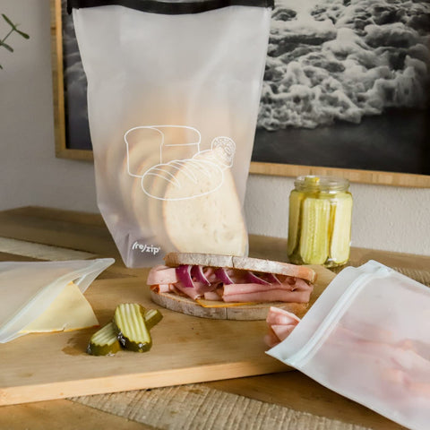 The (re)zip bag keeps bread fresh longer with secure sealing and easy roll-top use.