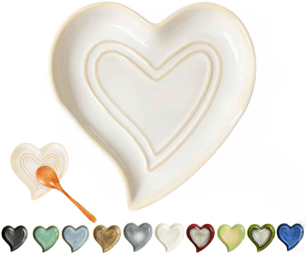 Rhobtyne heart spoon rest on stove top catches drips and adds charm.