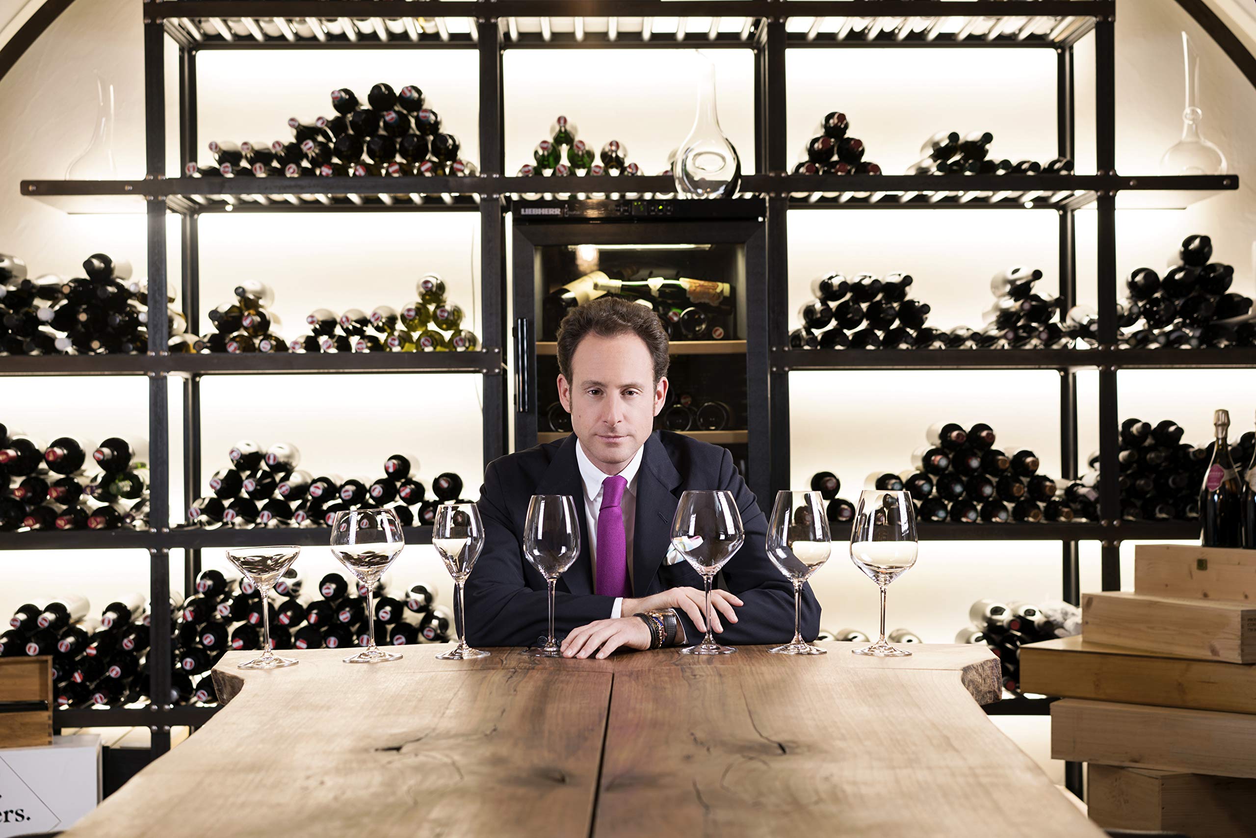 Riedel Extreme Pinot Noir bowl-shape glass emphasizes peatiness and plum notes.