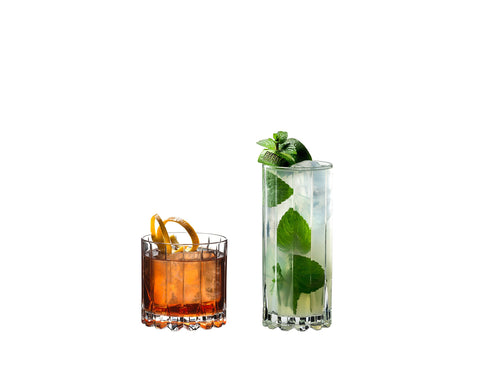 Riedel highball glass with large-format ice, preserves effervescence in cocktails