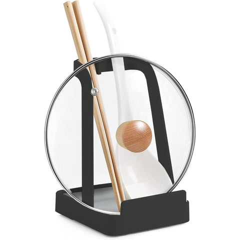 Rievem spoon rest and lid holder on stovetop, keeping utensils organized and ready.