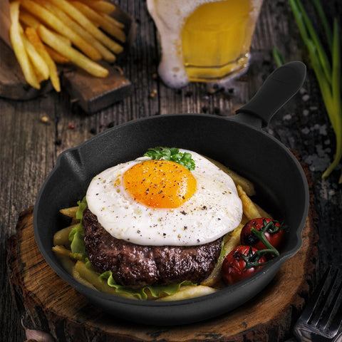 Rincentd oven-safe cast iron pans for transitions from stovetop to finished dishes.