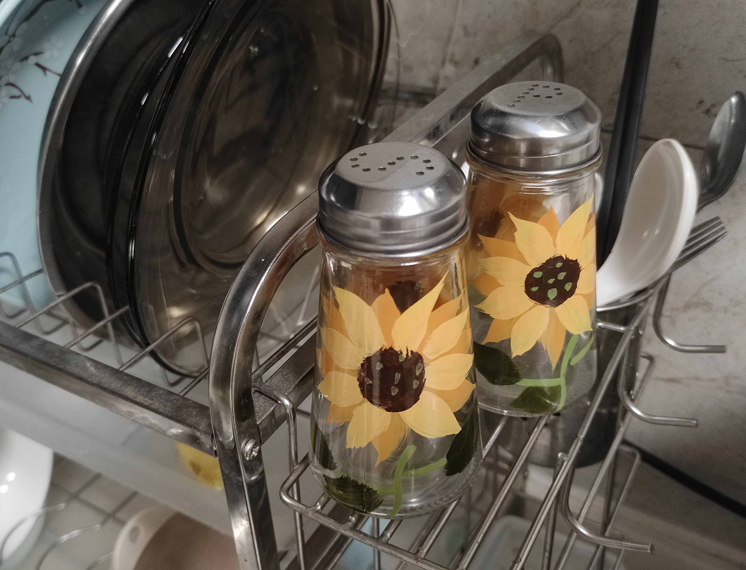 Sturdy stainless lids protect contents and simplify refilling every day.