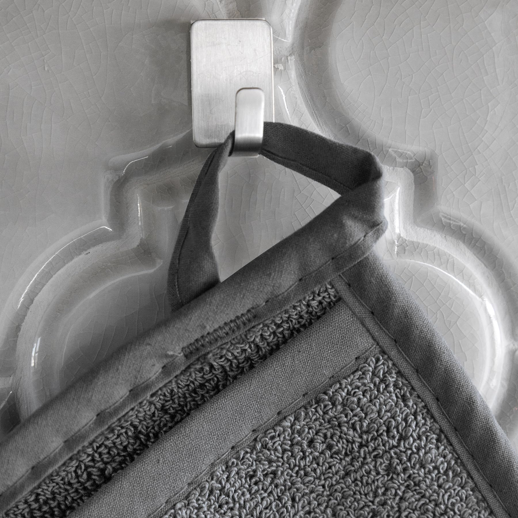 RITZ pot holder graphite with hanging loop demonstrates easy storage.