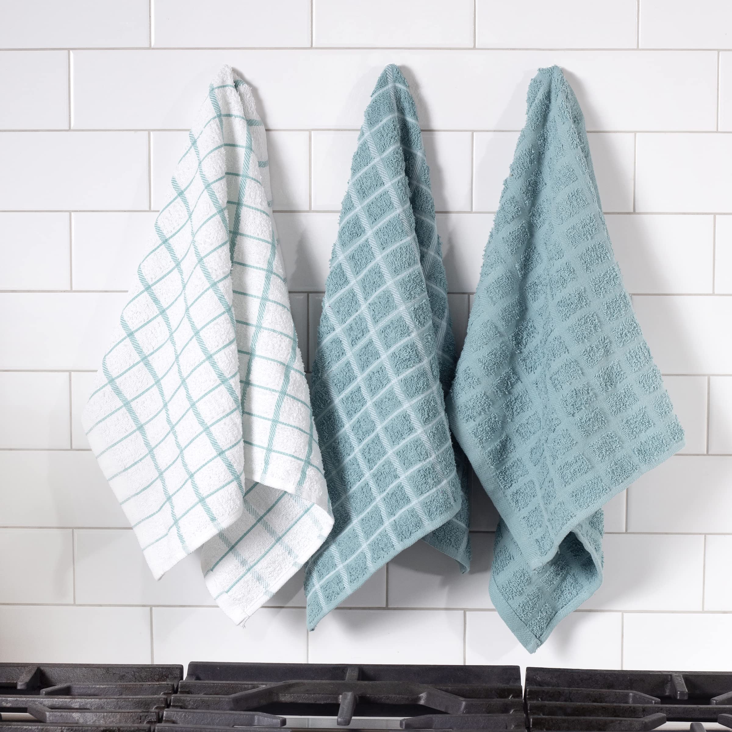 Ritz Premium terry towels in use spill cleanup and dish drying made easy.