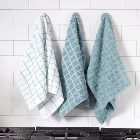 Ritz Premium terry towels in use spill cleanup and dish drying made easy.