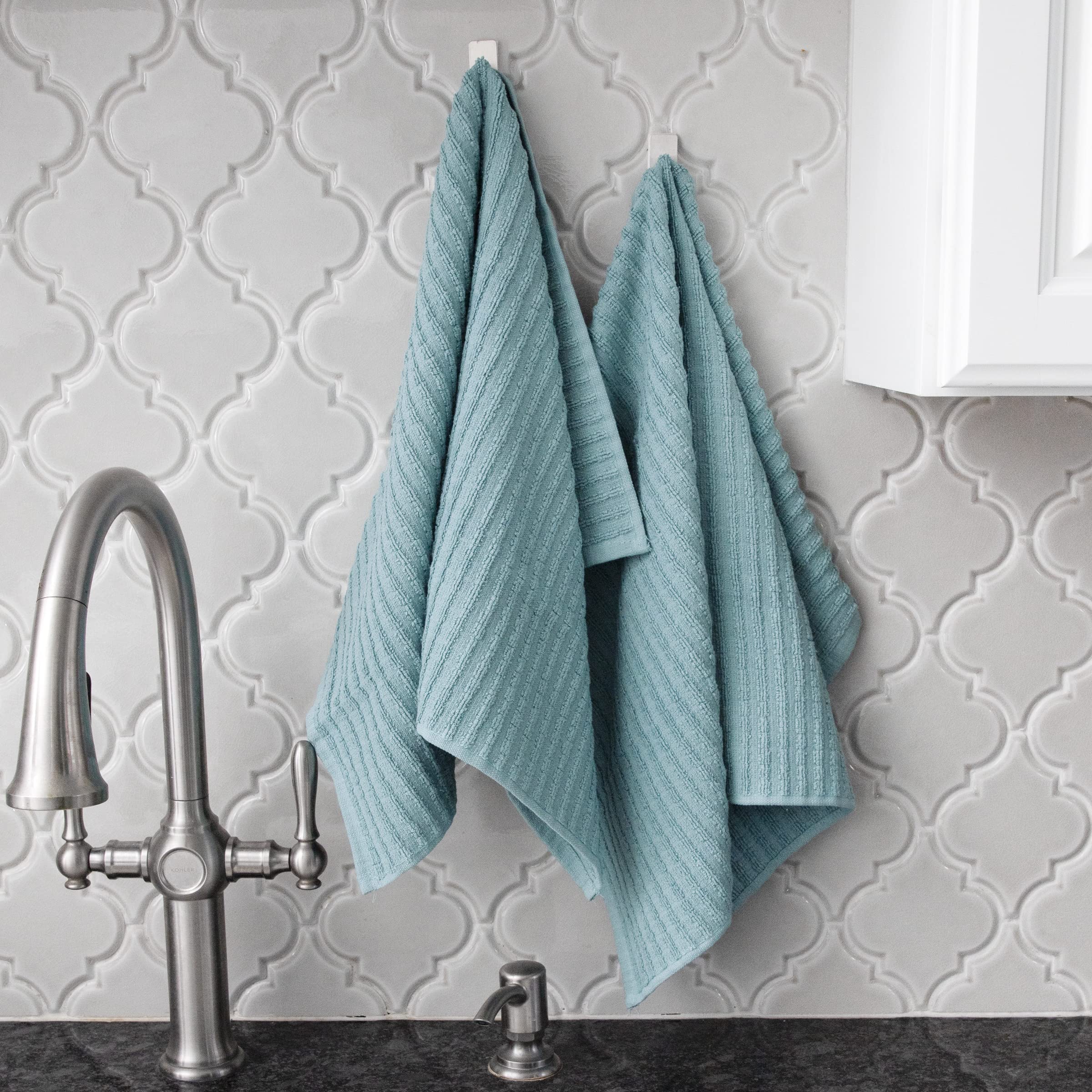 Ritz Royale towel pair enhances coordinated look with Royale textiles collection.