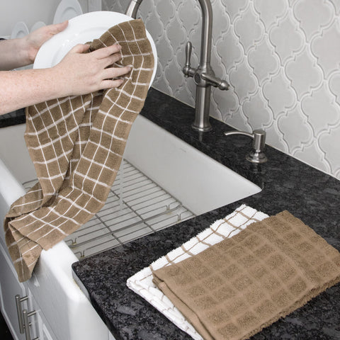 Ritz Terry Check towel folded by sink for quick reach