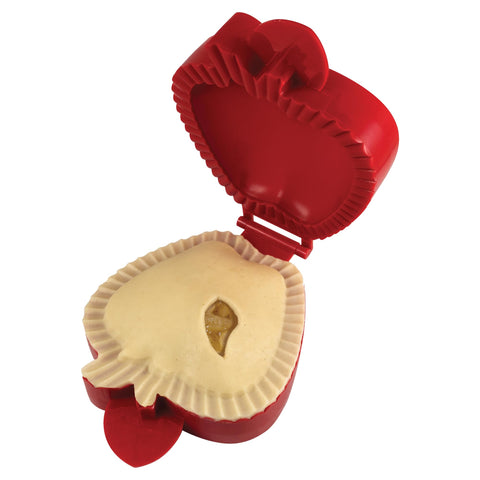 R&M Pocket Pie Maker close-up shows the pressing action for sealing pockets.