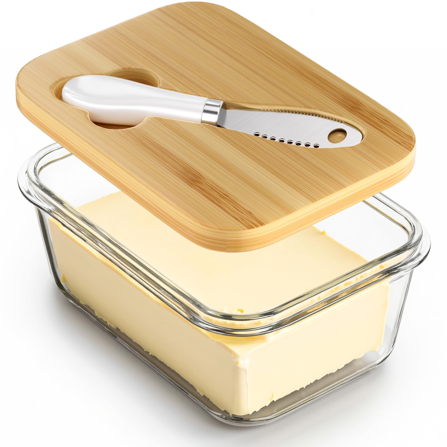 Road to purification glass butter dish with bamboo lid for fresh butter on the counter.