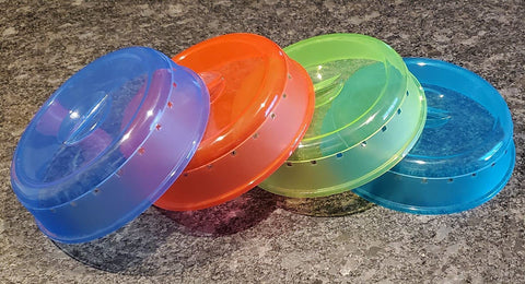 Rock vented clear lid on a plate shows steam control and visibility