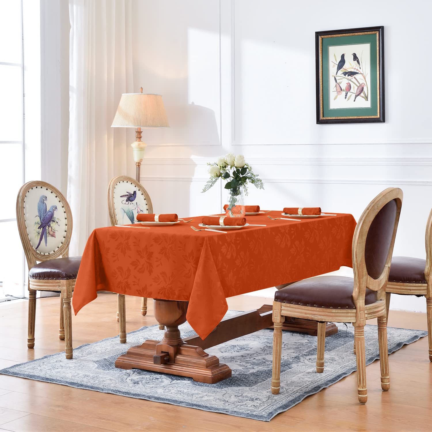 Romanstile burnt orange jacquard close-up showing woven floral texture.