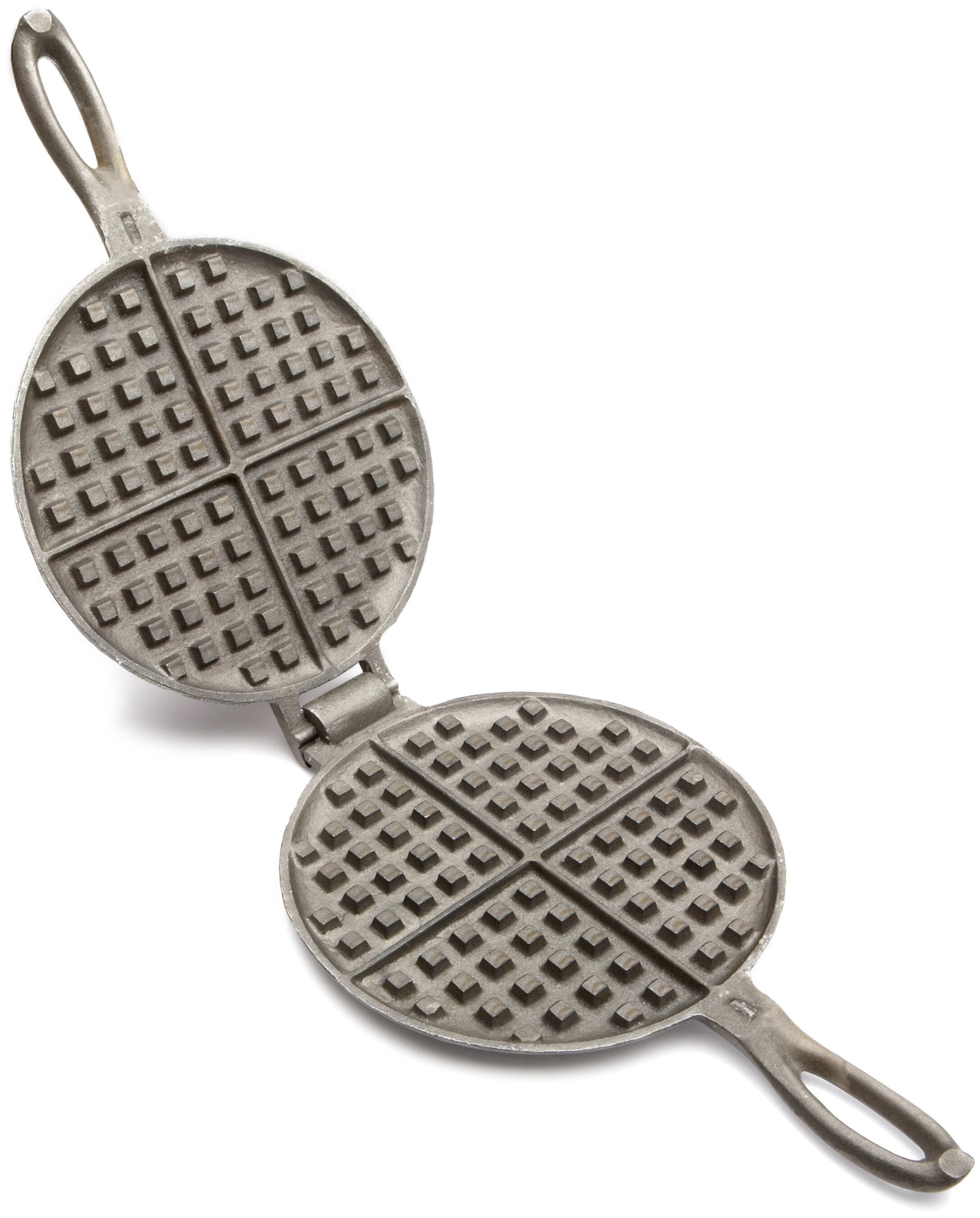 Rome waffle iron on a two-burner stove for even heat