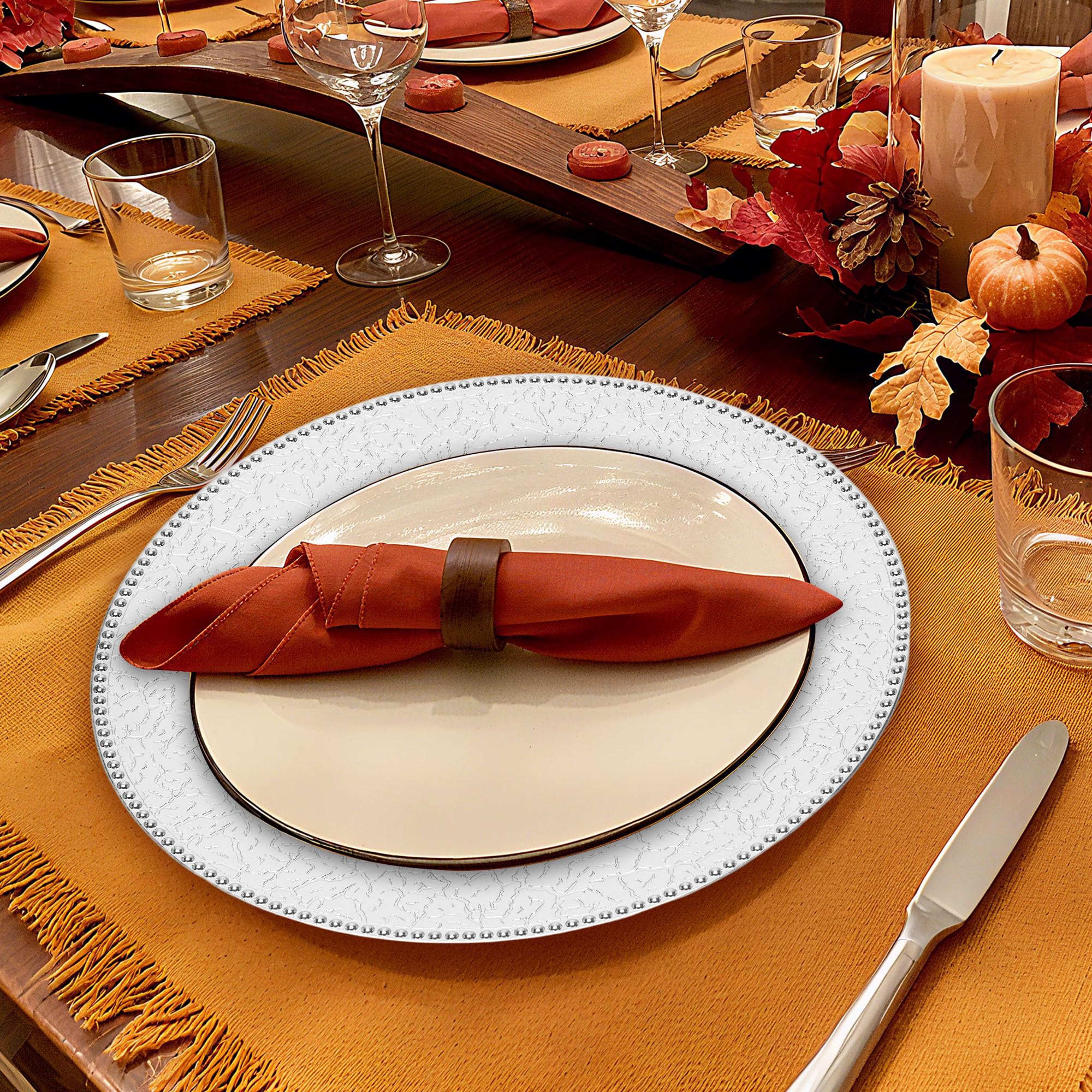 Roncooker silver charger plates 13-inch on table display enhance wedding or event tables.