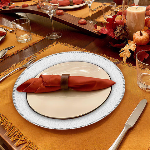 Roncooker silver charger plates 13-inch on table display enhance wedding or event tables.