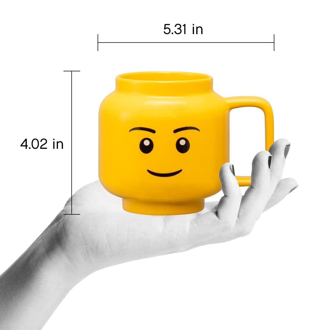 Front view of Room Copenhagen LEGO mug showing the playful boy face design.