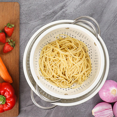 Rorence colander set neatly nests for compact storage after cooking.