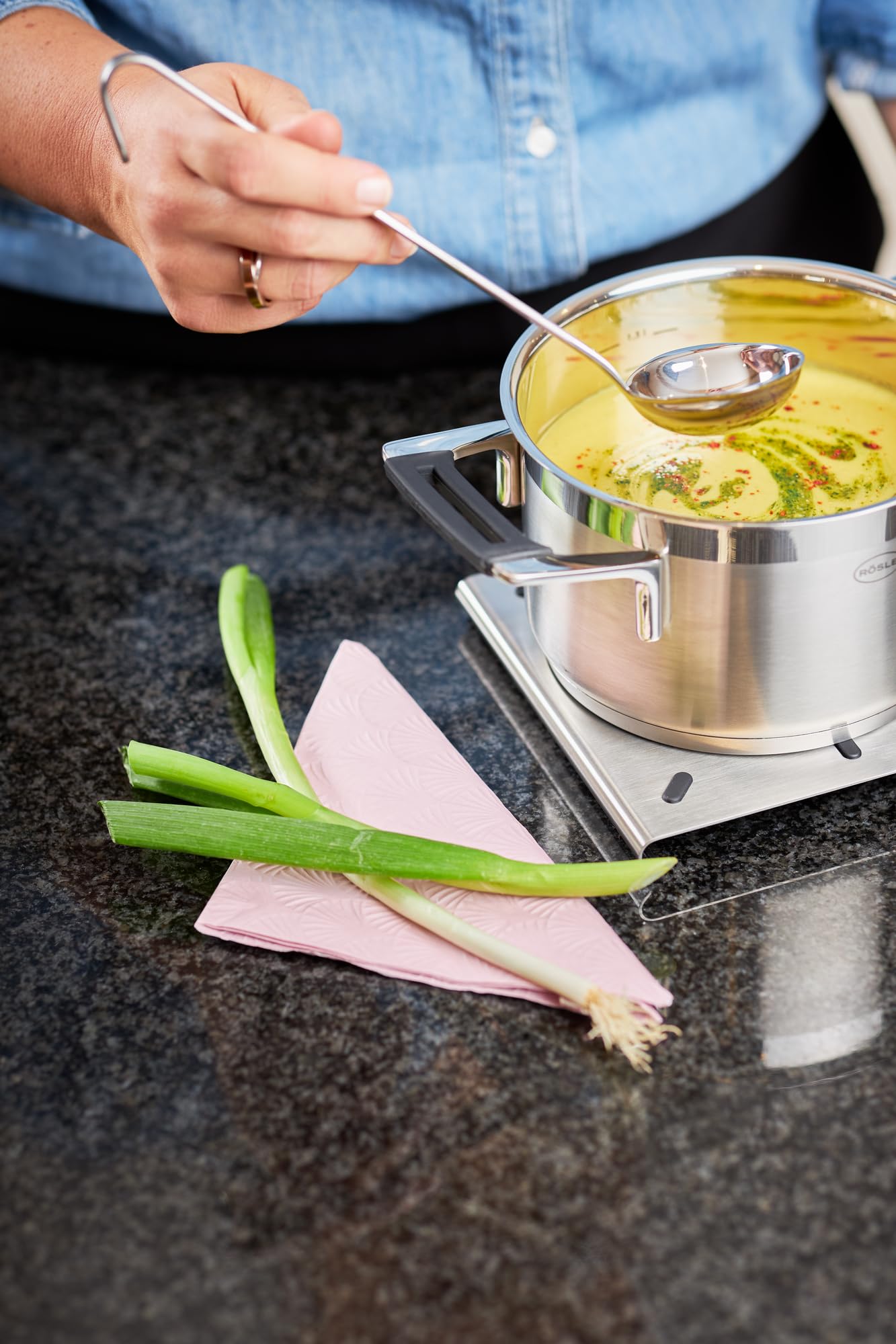 Rösle modern-classic ladle suited for kitchen to table serving.