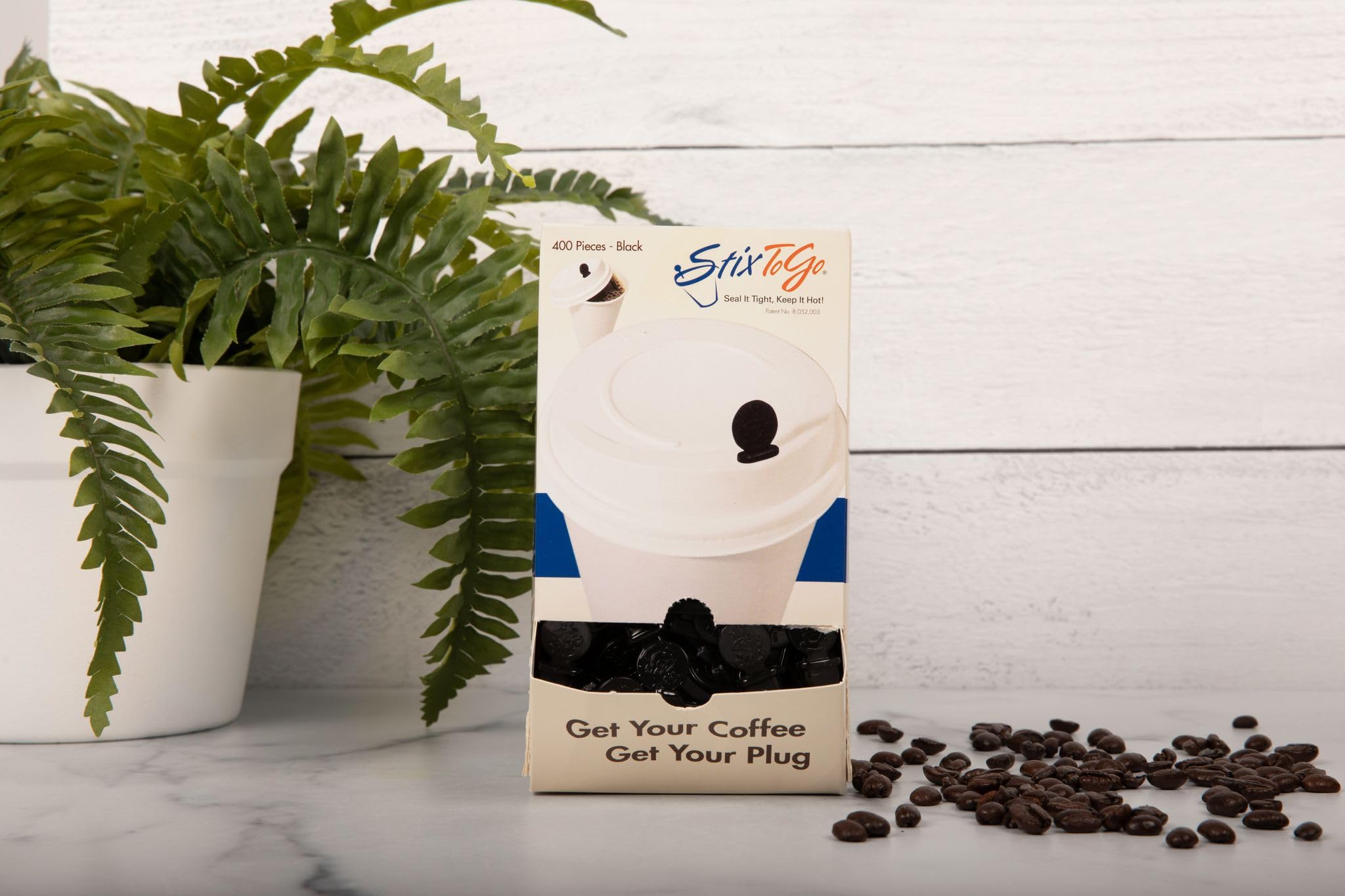 Royal StixToGo hot-coffee plug helps minimize spills while commuting.