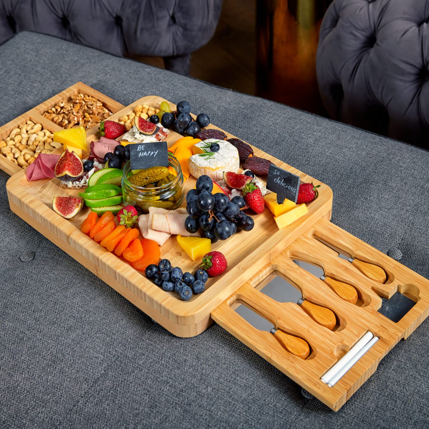 RoyalHouse dining table setup featuring the bamboo cheese board for entertaining