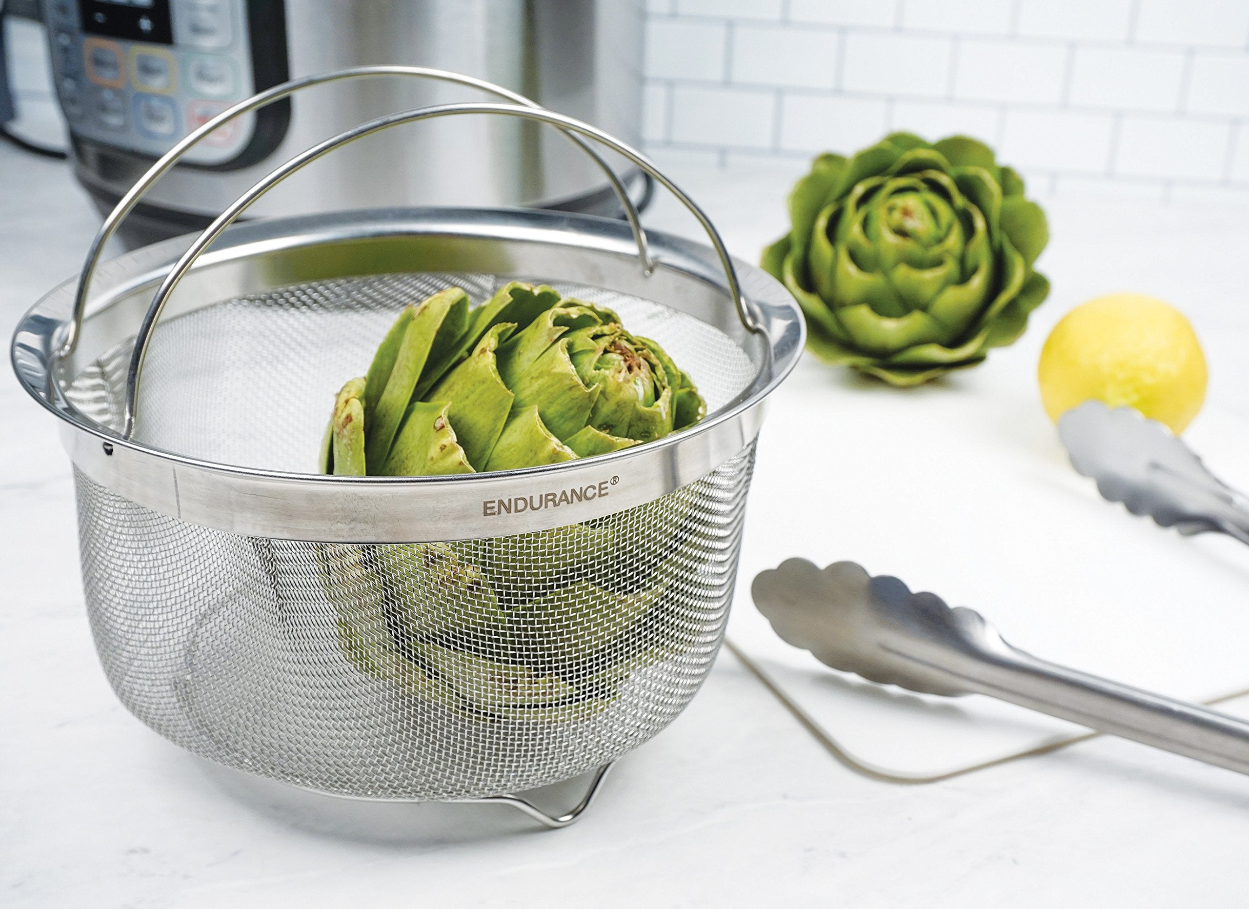 RSVP International pasta-strainer basket fits standard pots for quick draining after boiling.