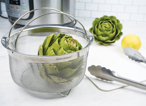 RSVP International pasta-strainer basket fits standard pots for quick draining after boiling.