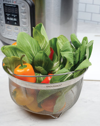 RSVP International elevated feet keep the basket stable above water for even steaming.