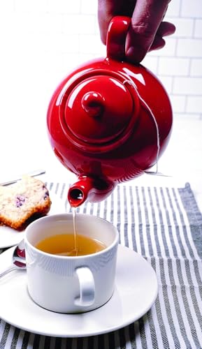 Pour spout design of RSVP teapot minimizes leaves in cup for clean sipping.