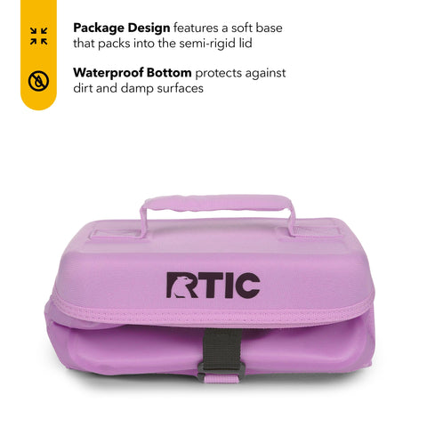 RTIC lavender cooler in beach scene highlights versatile, on-the-go cooling for outings