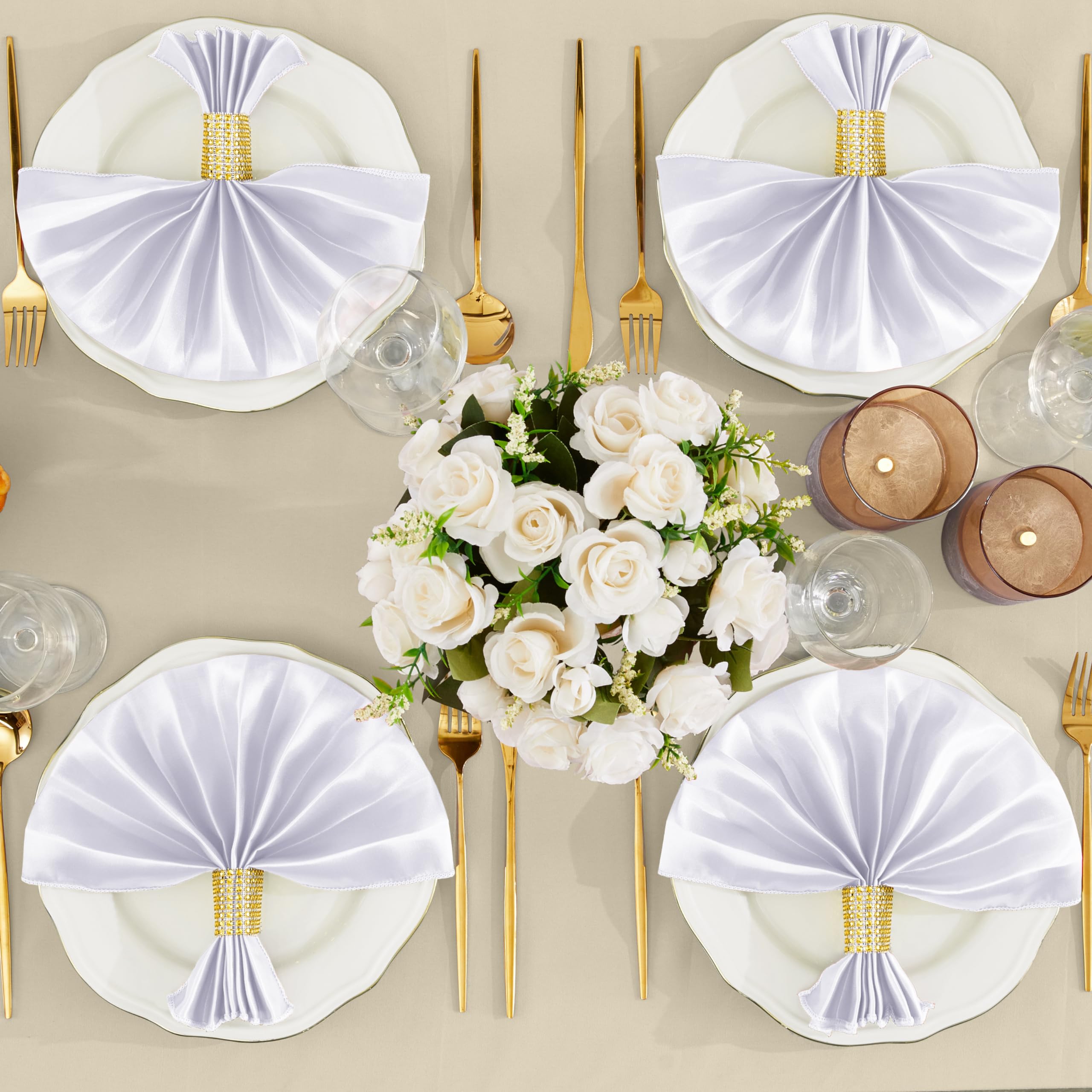 RUDONG M gold napkin rings paired with satin napkins for a festive touch