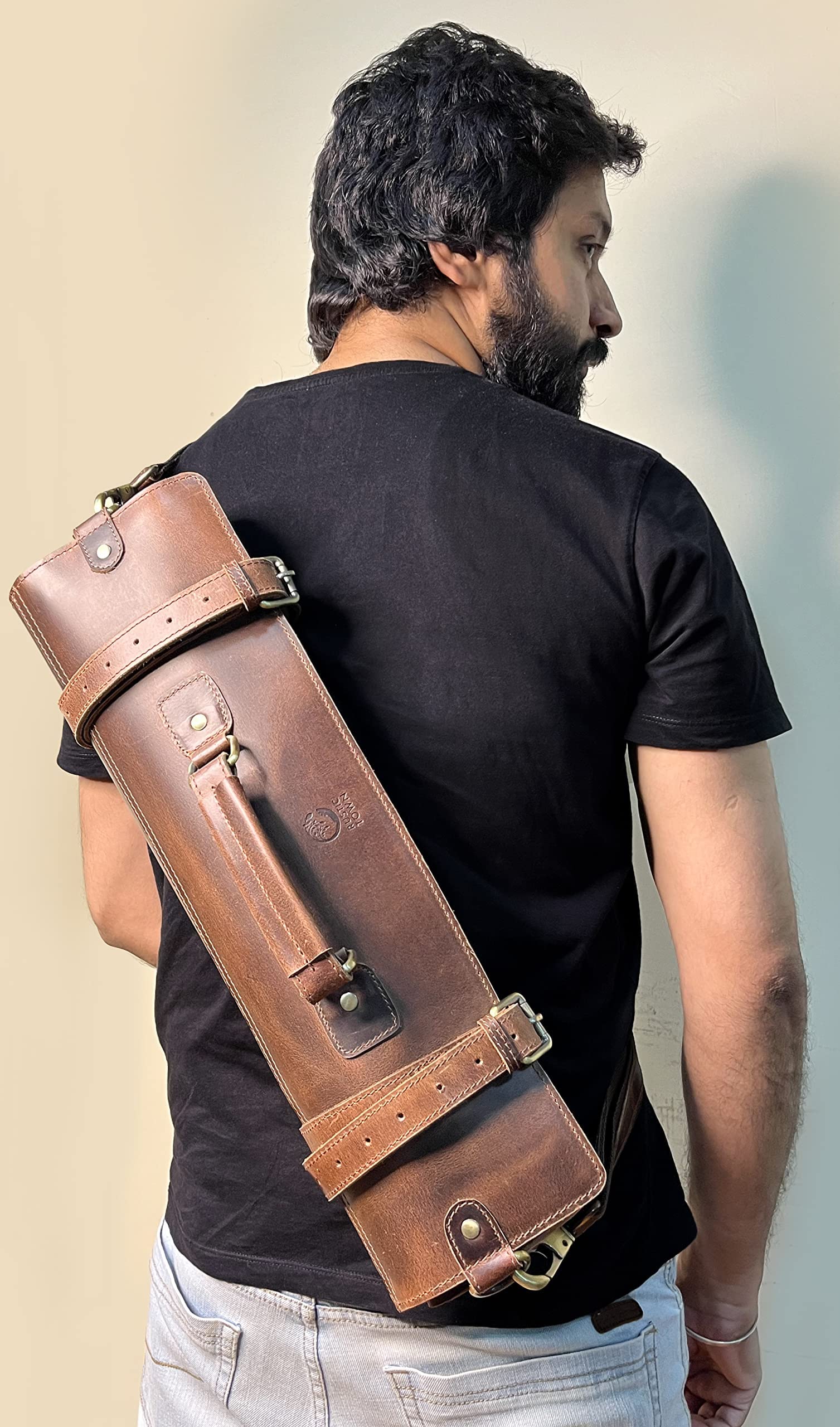 RUSTIC TOWN adjustable detachable strap for flexible carrying options.