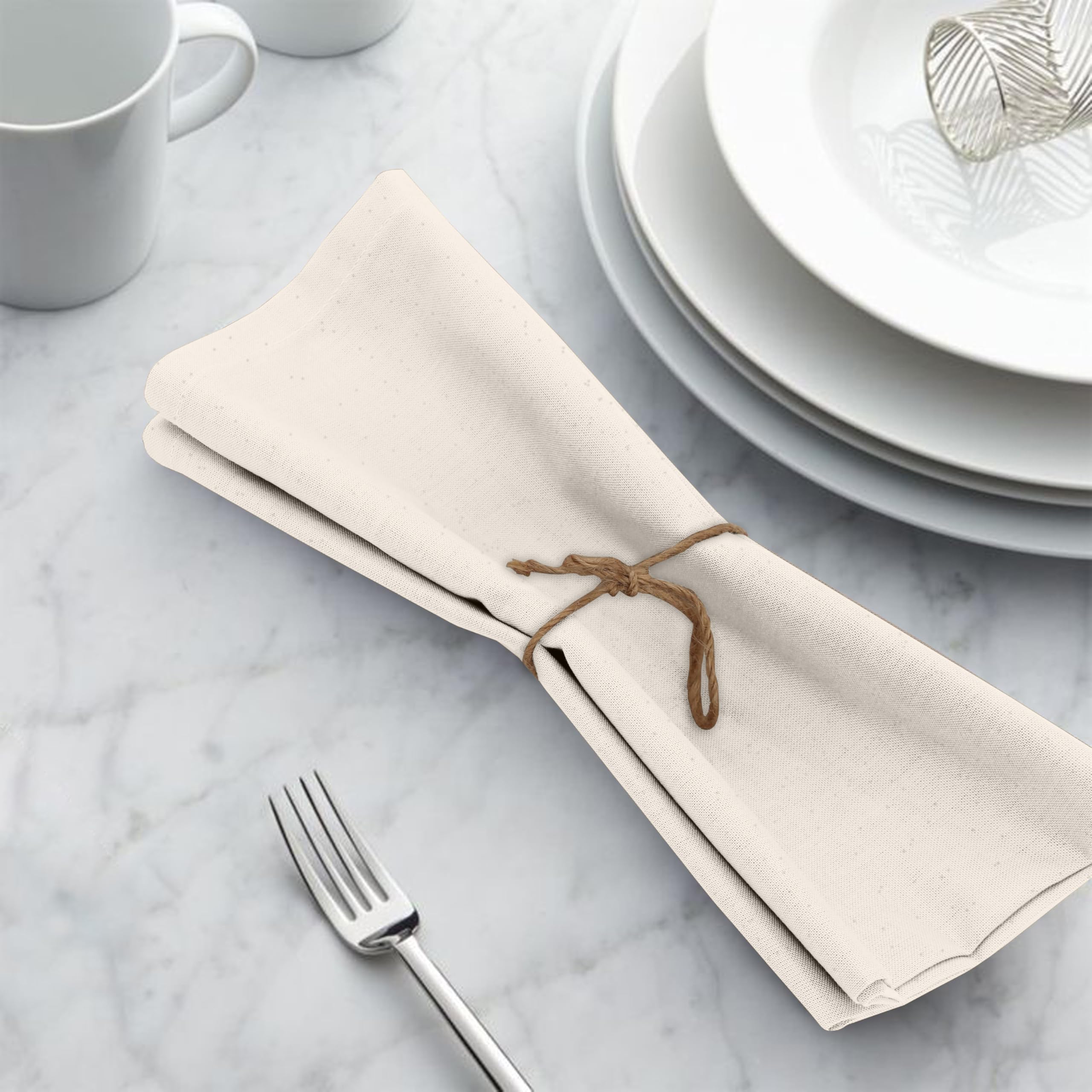 Stitching and hem detail on Ruvanti napkins demonstrates quality finish.