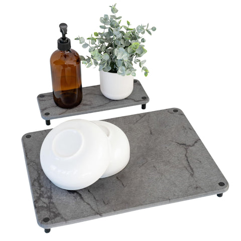 RYMA Home Stone Drying Mat on a kitchen counter absorbing moisture quickly