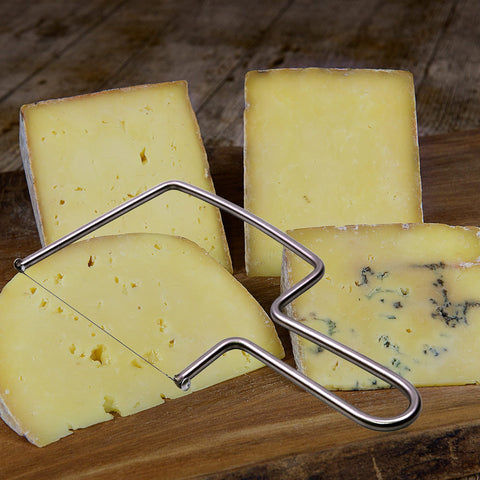 Close-up of S Aeon Design cheese slicer wire assembly for smooth cuts.
