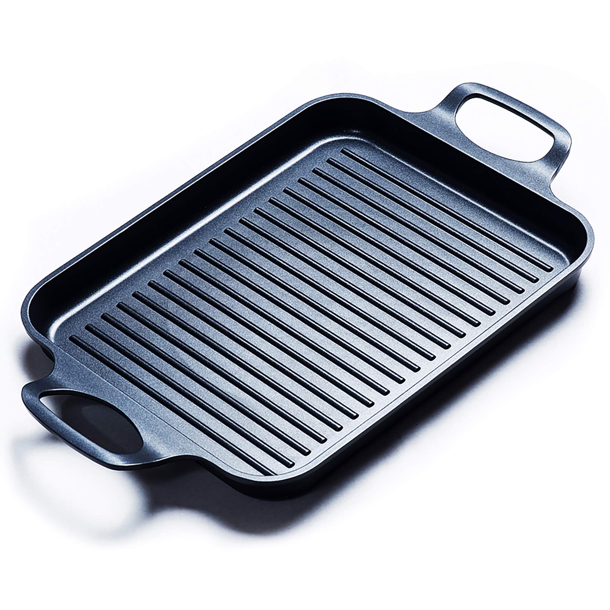 S·KITCHN nonstick grill pan on induction top showing even heat for indoor grilling