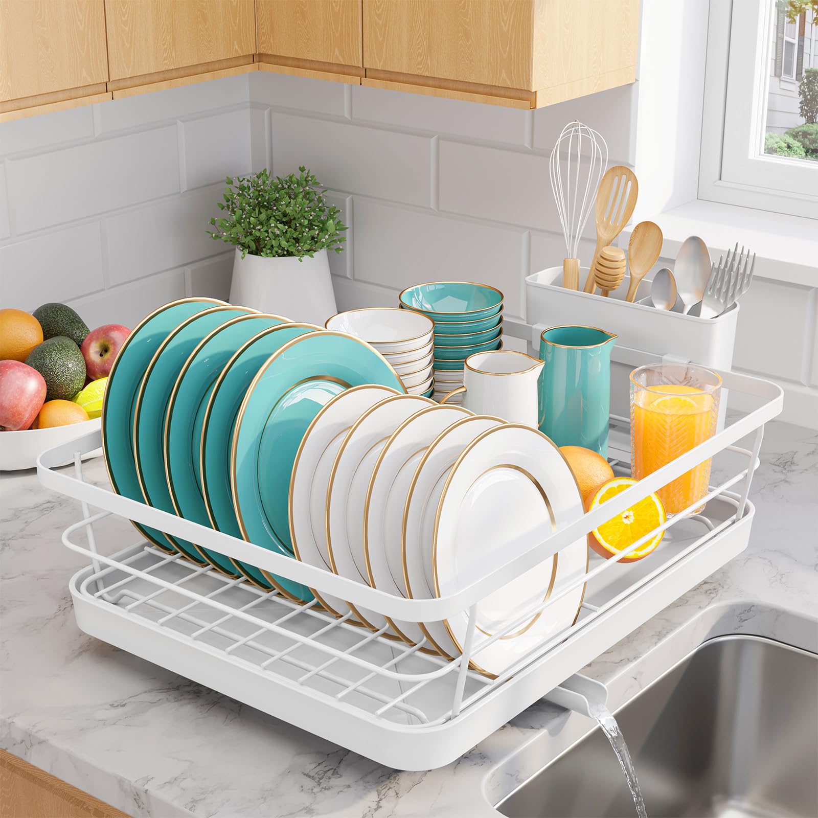 Sakugi dish drying rack on white countertop for compact kitchen organization.