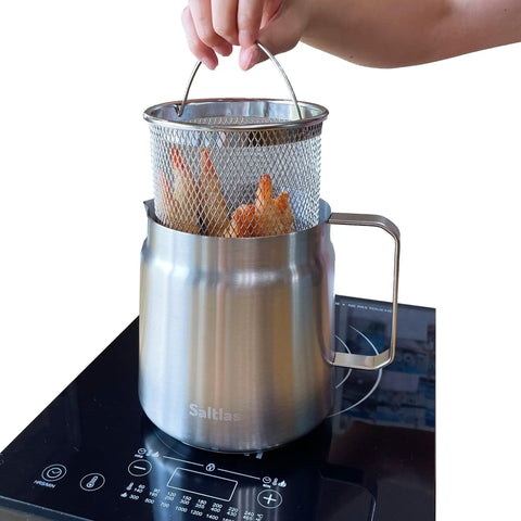 Saltlas deep fryer pot with basket for easy home frying and mess reduction.