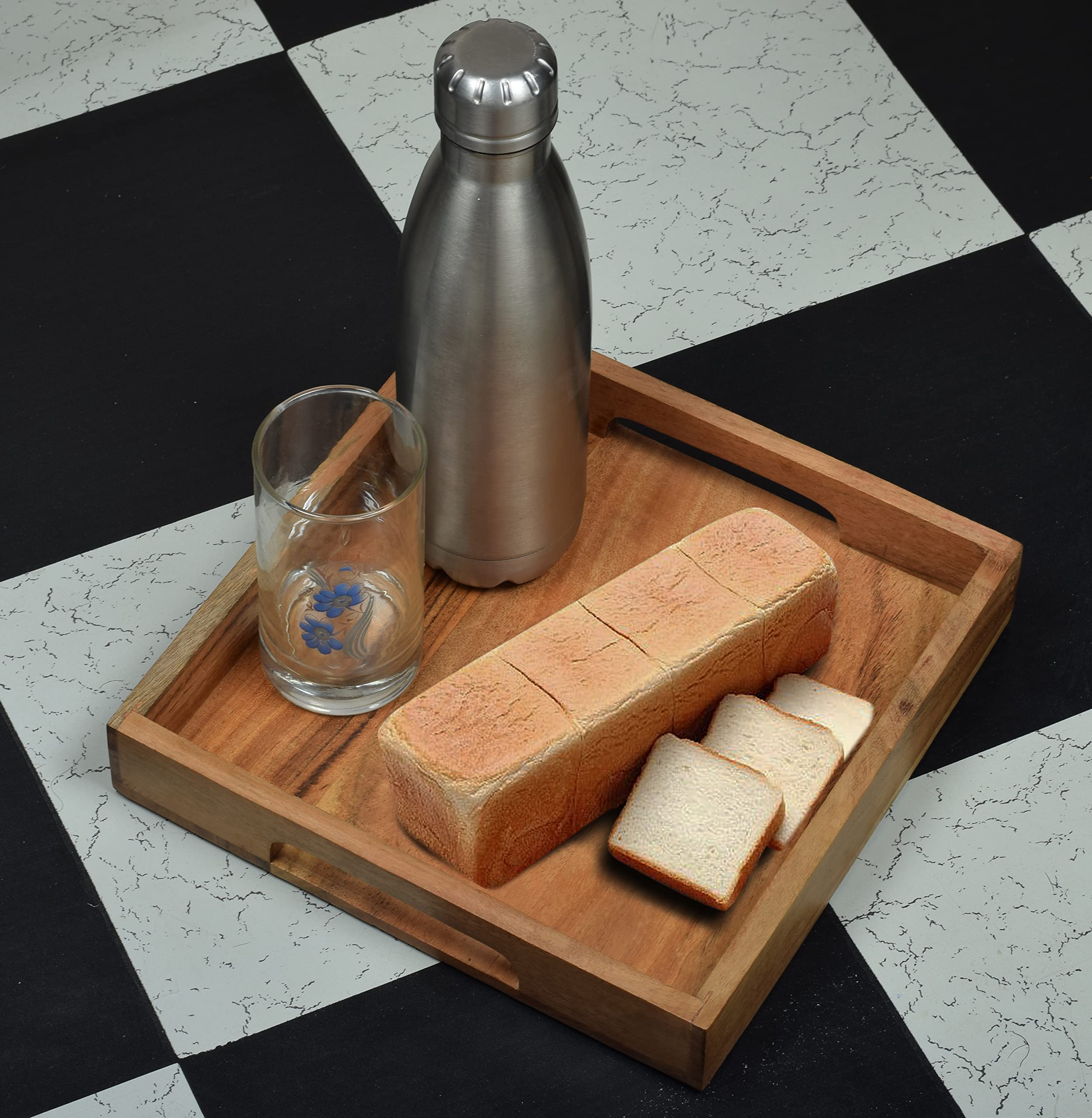 Samhita acacia tray in antique-style finish enhances decor.