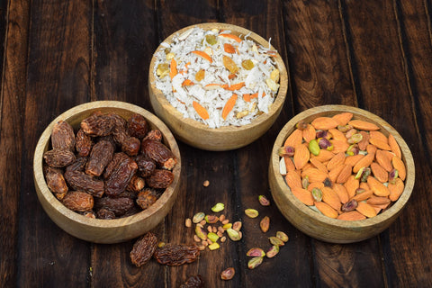 Samhita Mango Wood Round Bowl for appetizers, ideal for sharing dips and bites.