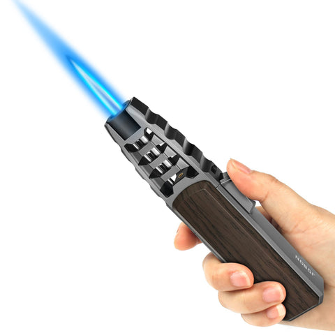 Samniu FireSaber torch held in hand with ergonomic design for precise kitchen control.