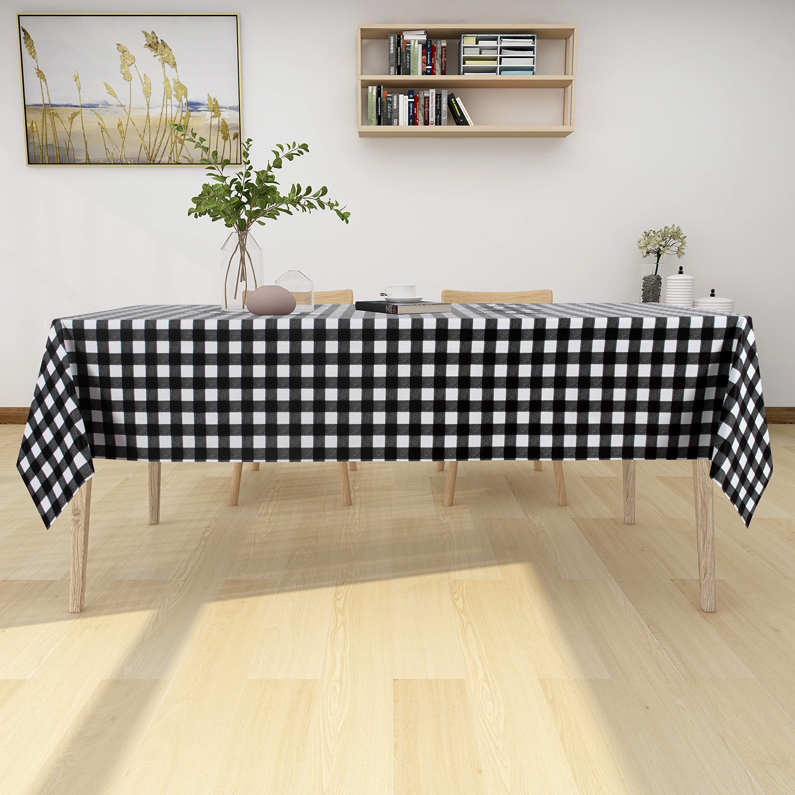 Sancua dining setup tablecloth on a table showcasing a clean black-and-white look.