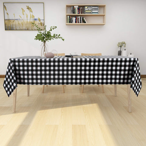 Sancua dining setup tablecloth on a table showcasing a clean black-and-white look.