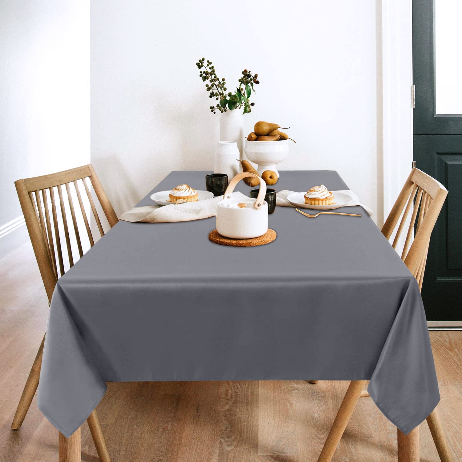 Sancua light grey tablecloth draped over a buffet setup for events.
