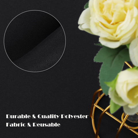 Outdoor camping table setup with Sancua round tablecloth in black.