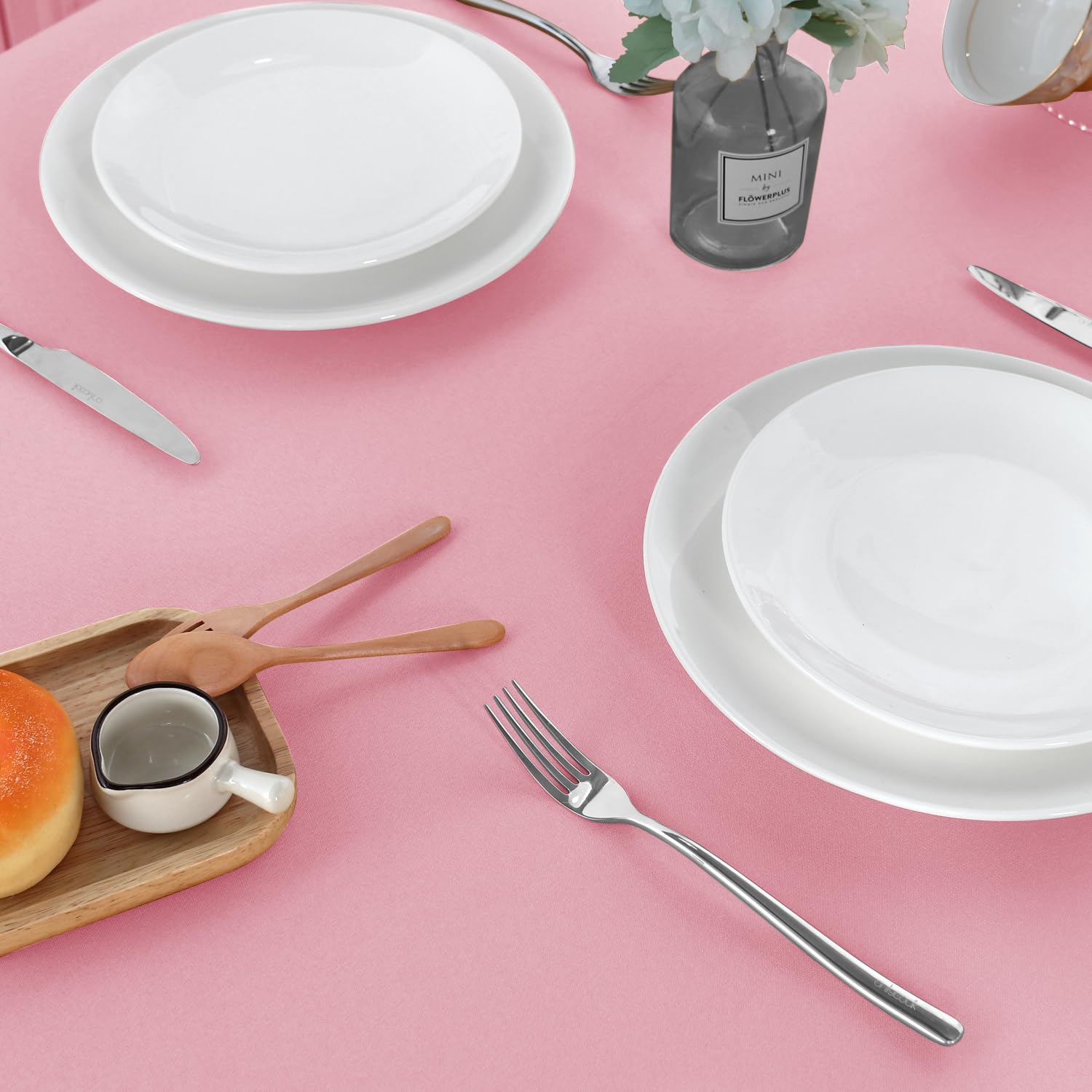 Sancua pink tablecloth detail-hem adds polished finish.