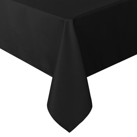 Sancua rectangle tablecloth in black, shown as a flat lay for a neat dining setup.