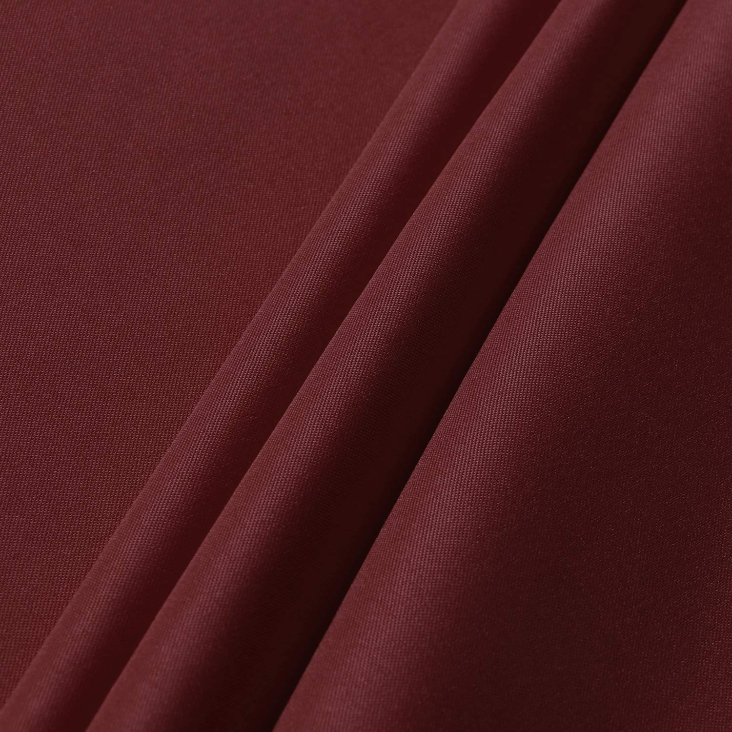 Sancua burgundy round tablecloth on buffet display creates elegant food presentation.